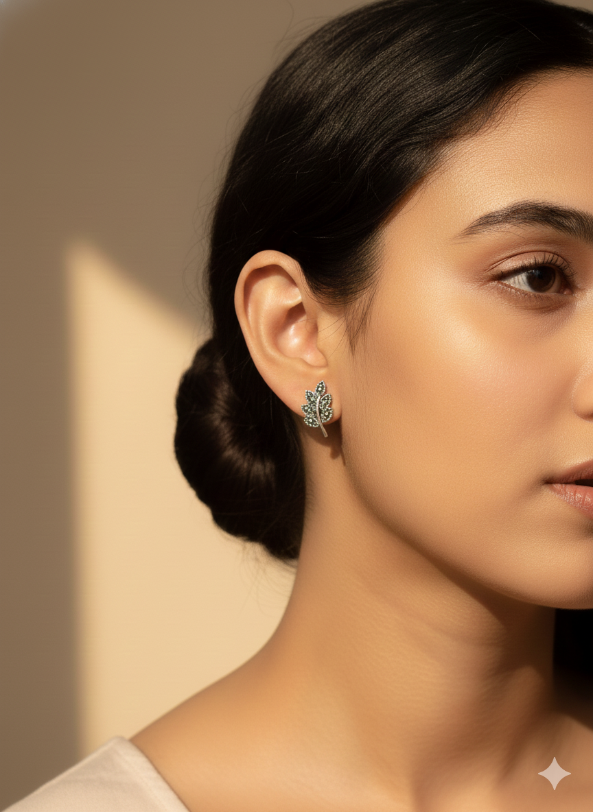 Oxidized Silver Leaf Stud Earrings on model